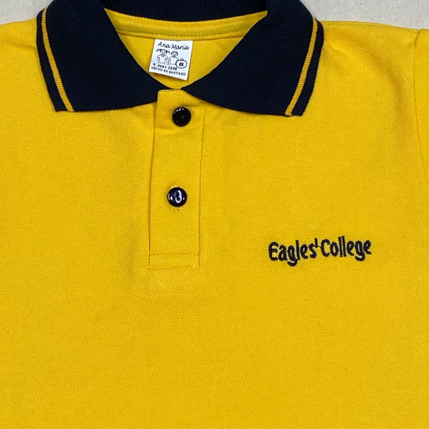 Polera Amarilla Piqué Manga Corta Colegio Eagles